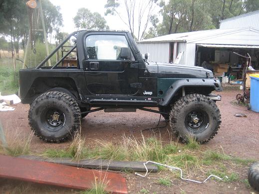 Click image for larger version

Name:	03 TJ w Swampers1.JPG
Views:	187
Size:	54.5 KB
ID:	46081